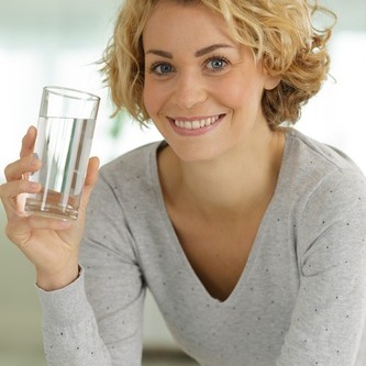 Woman drinking clean water